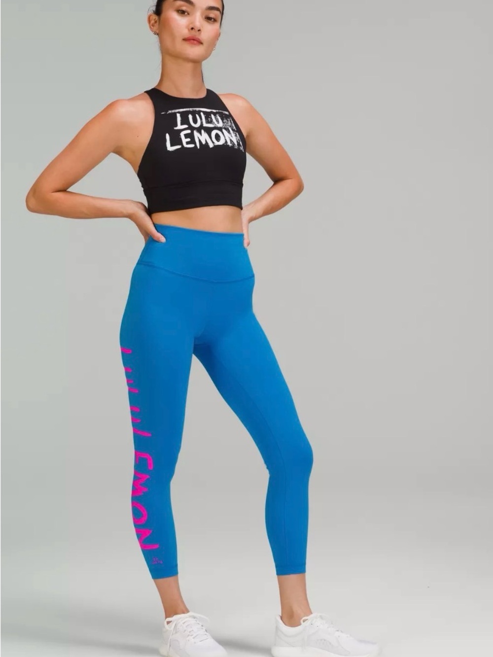 Lululemon Ed Curtis Royal Blue Leggings with Hot Pink Logo with waist trainer